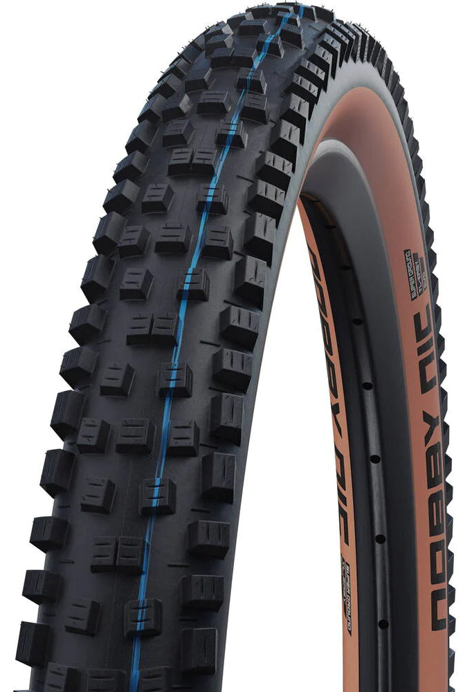 Folding band Schwalbe Nic Nic Super Ground 27.5 x 2.40 62-584 mm - Bronze Sidewall